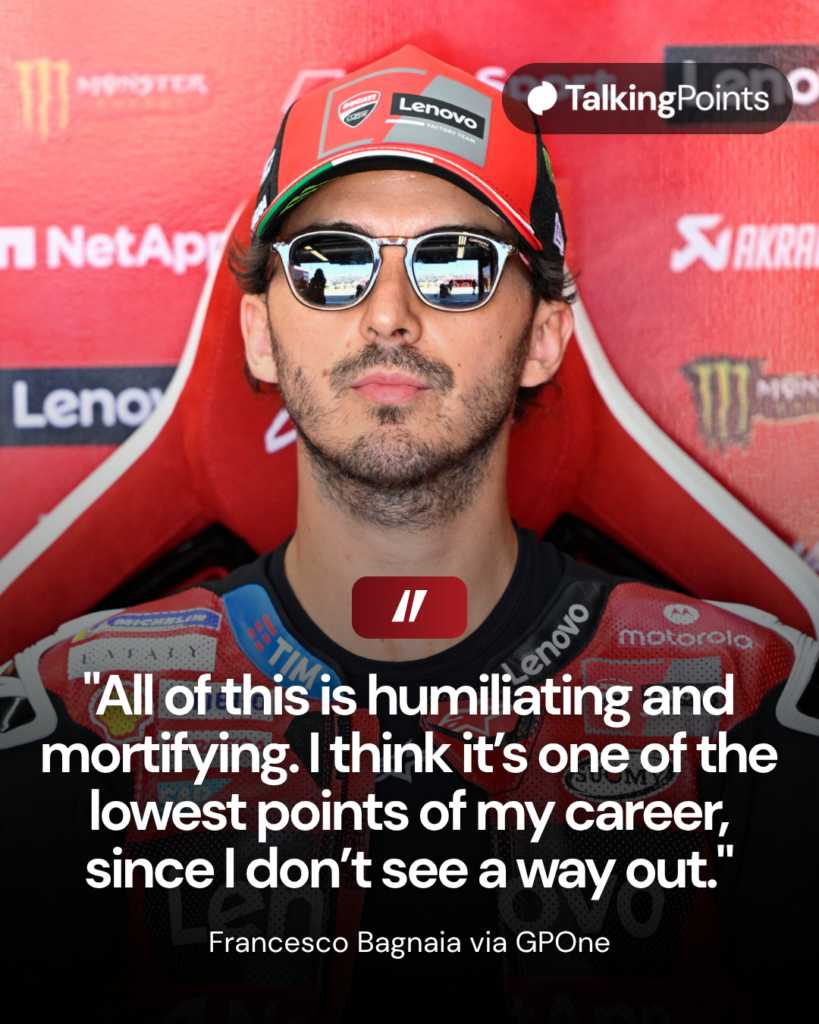 Francesco Bagnaia sentado na garagem da Ducati MotoGP
